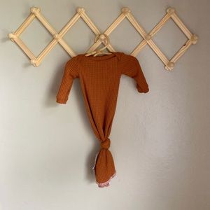 Handmade knotted baby gown